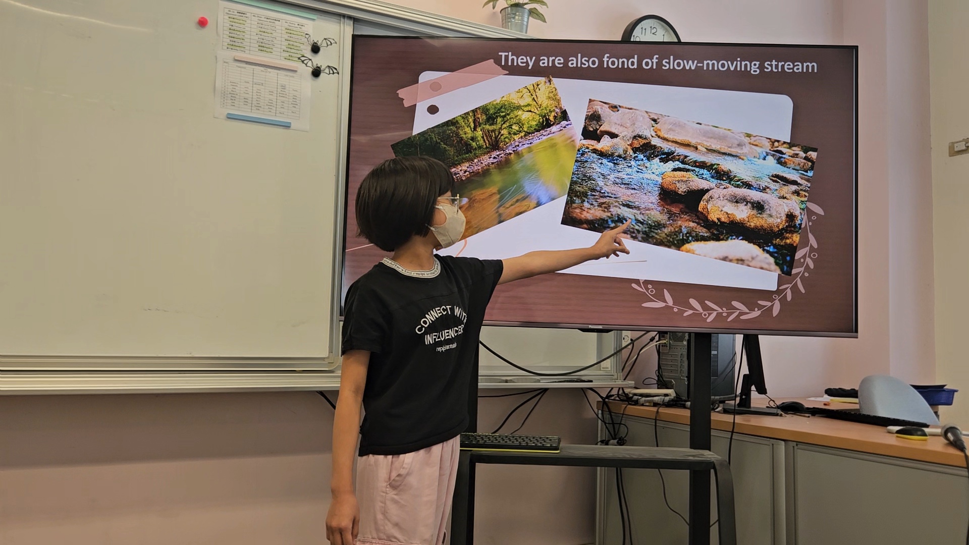 Grade 5's Anita knows how to direct attention in her presentations.