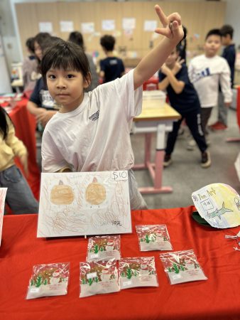 Sara showing off her art.